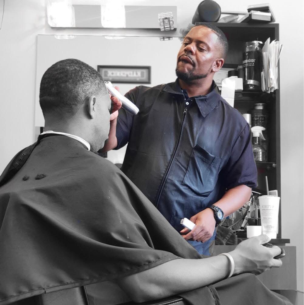 A.T. Diggs — Master Barber at work